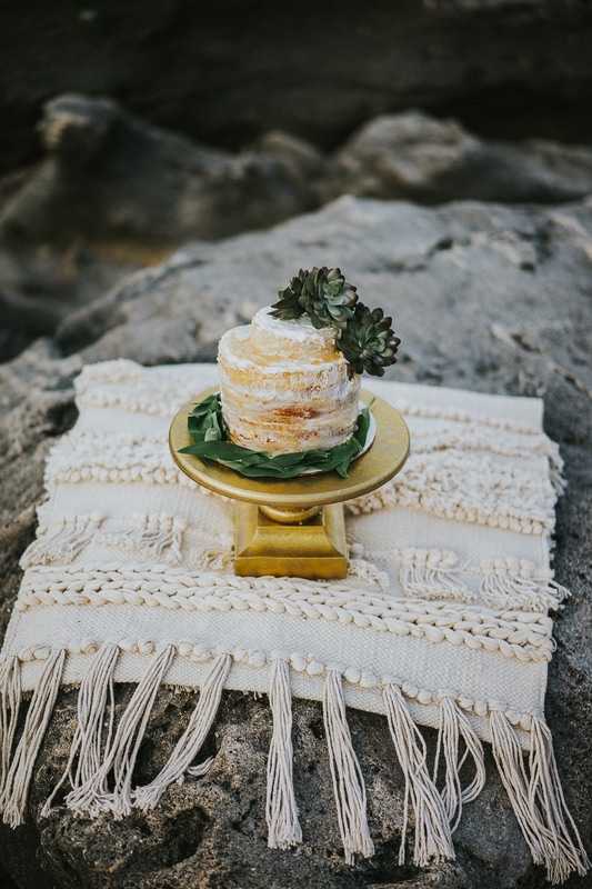 Coral Cove Beach Elopement naked cake on white tassel beach towel