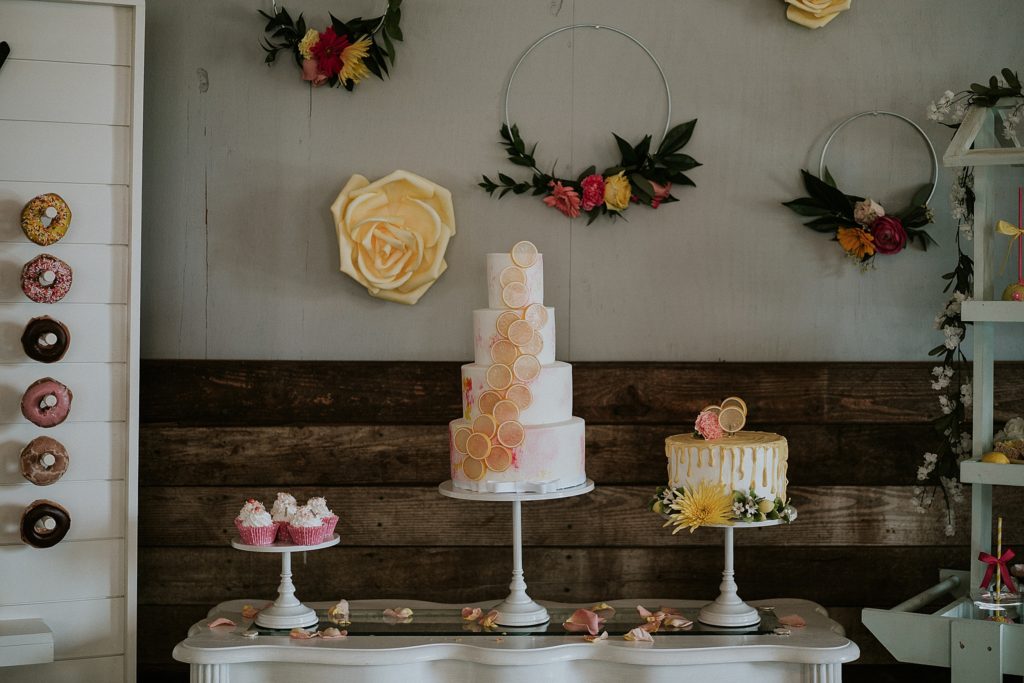 Pink Lemonade photoshoot dessert table and wedding cakes at Twisted Oak Farm Vero Beach FL barn wedding