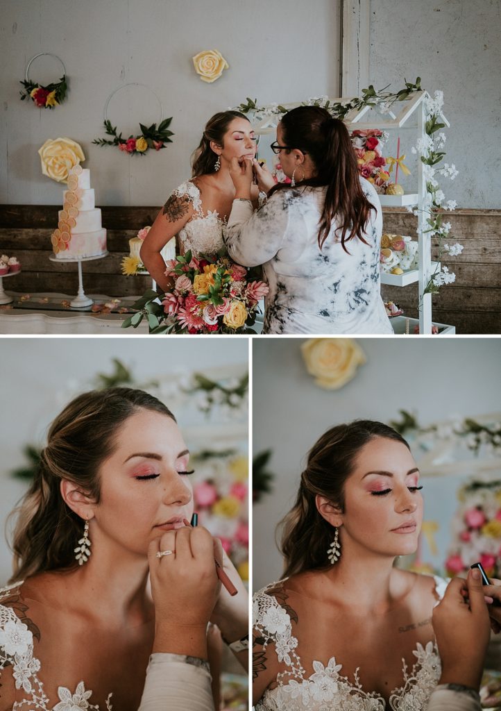 Bride getting makeup done for Pink Lemonade photoshoot barn wedding at Twisted Oak Farm in Vero Beach FL