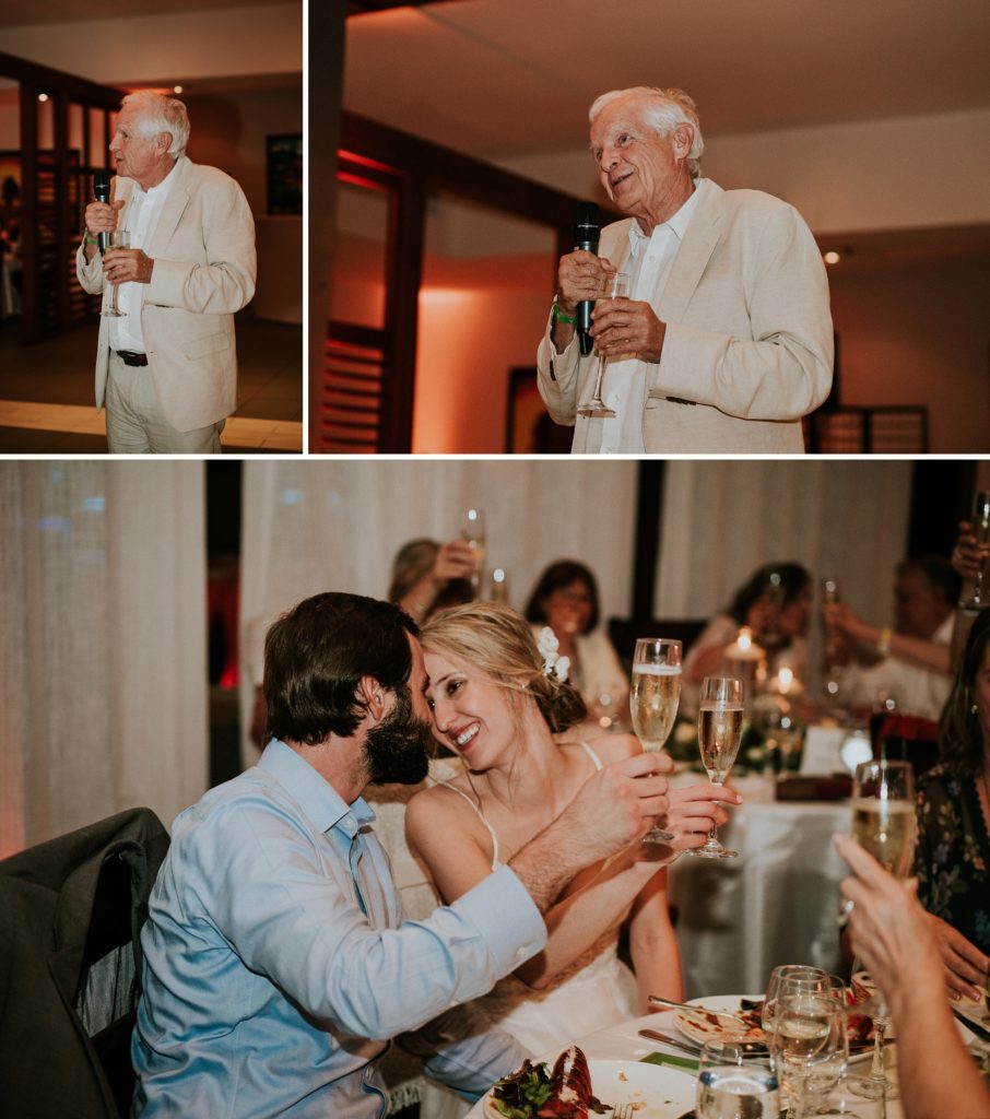 Bride and groom toast during her father's speech