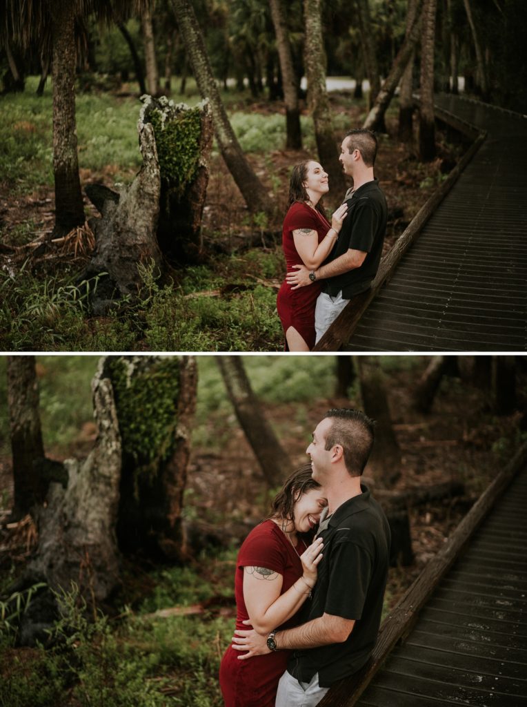 Engagement photos of couple embracing by birdwalk at Myakka River State Park