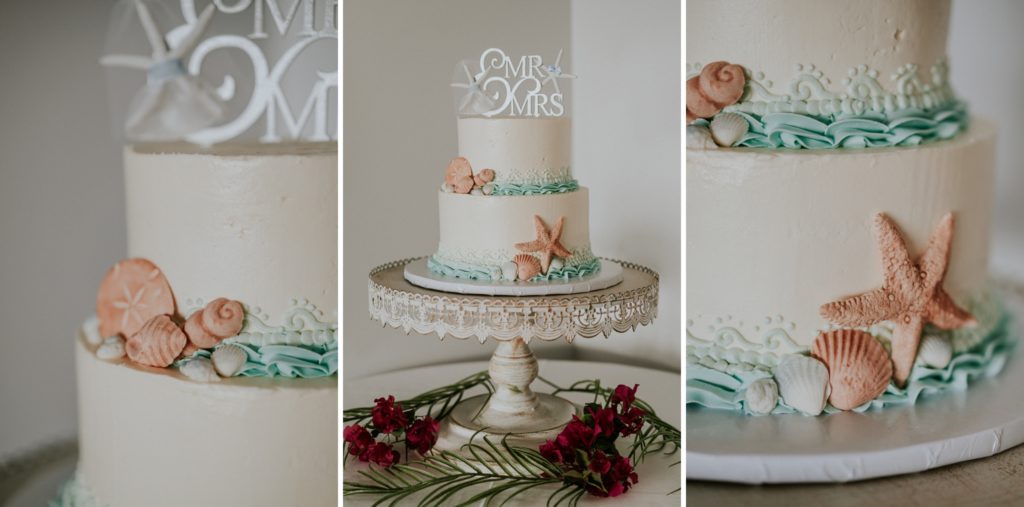 Coastal beach themed FL destination wedding cake with blue icing waves and coral seashells and starfish
