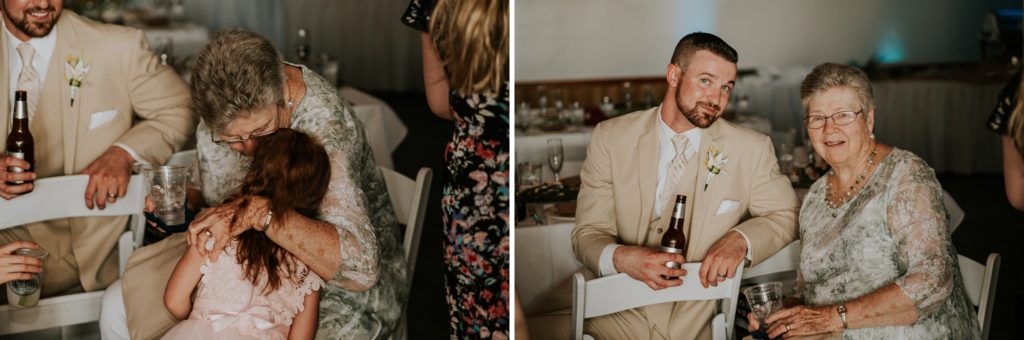 Grandmother kisses flower girl and sits next to the groom