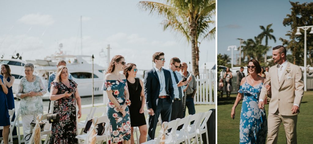 Guests watch as groom walks his mom down the aisle