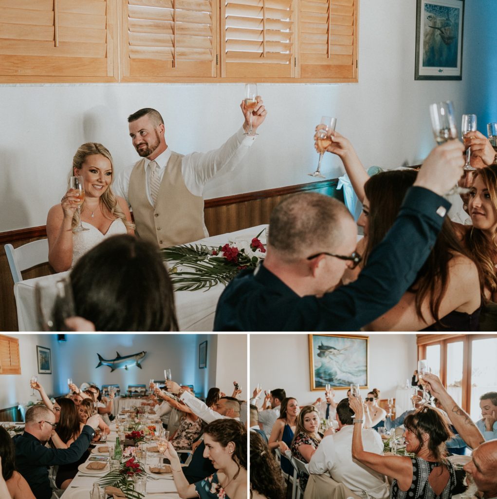Guests toast the newlyweds at Sailfish Marina Resort FL destination wedding