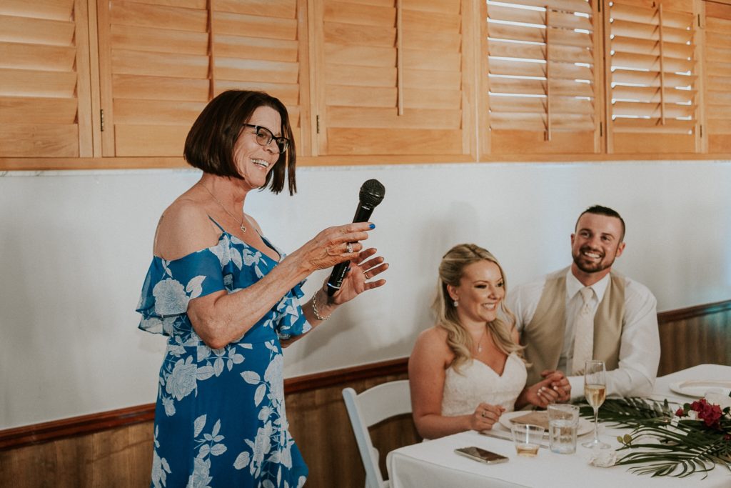 Mother of the groom gives wedding toast at Sailfish Marina Resort small FL destination wedding