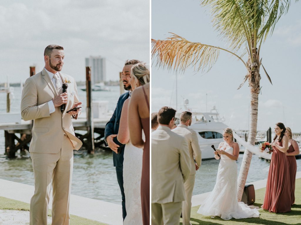 Groom and bride read vows on phones with boats at Florida destination wedding