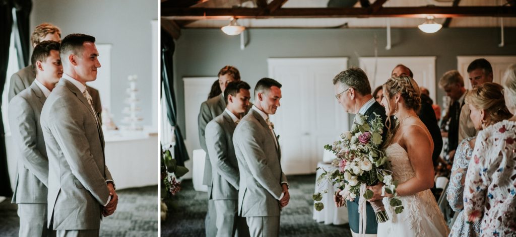 Groom sees bride walk down aisle in indoor ceremony