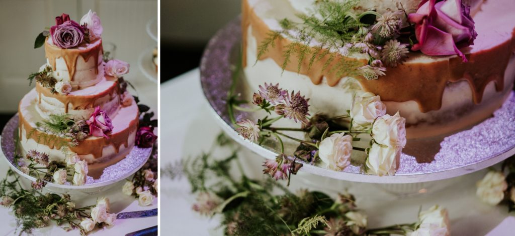 Close up of naked cake with purple roses
