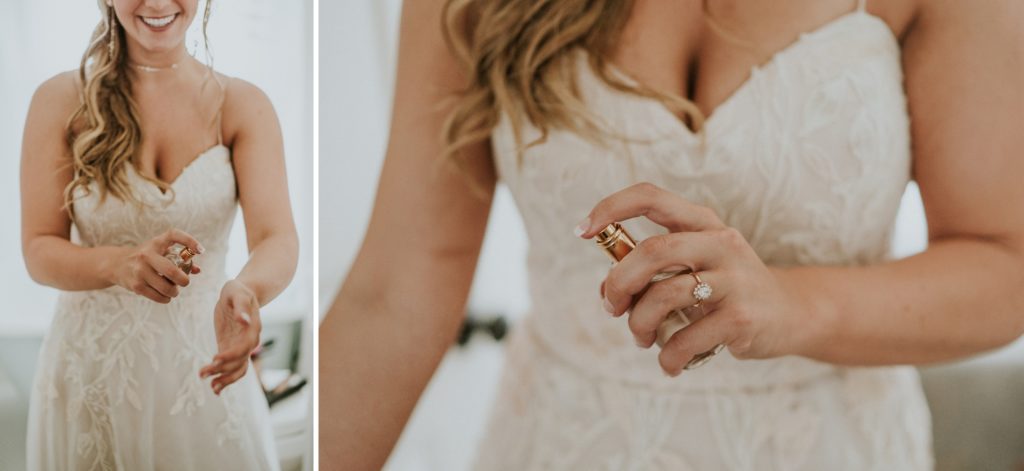 Close up of bride spraying perfume bottle