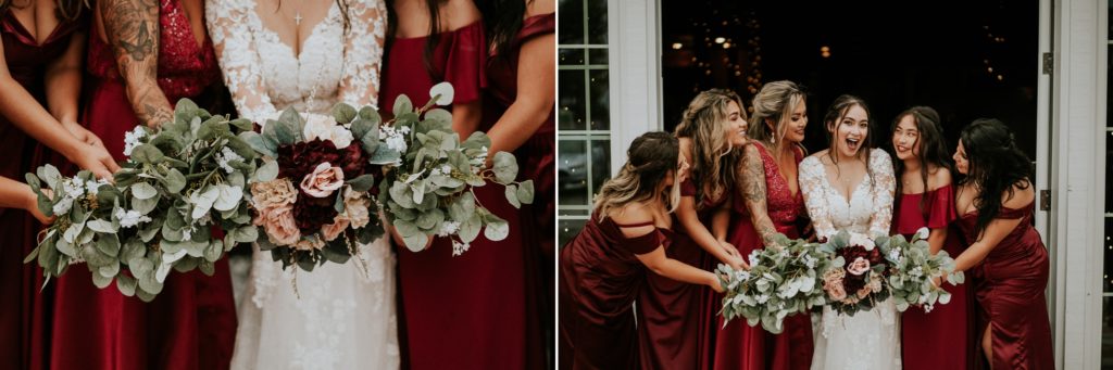 Bridesmaids wearing red dresses look at bride in white lace flower gown with close up of their fake pink and red rose bouquets
