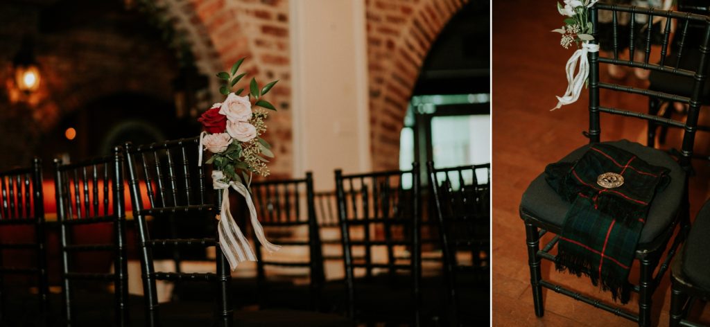 Black chairs lined up for indoor ceremony in brick room