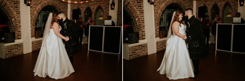 Newlywed bride and groom share first dance in brick reception room