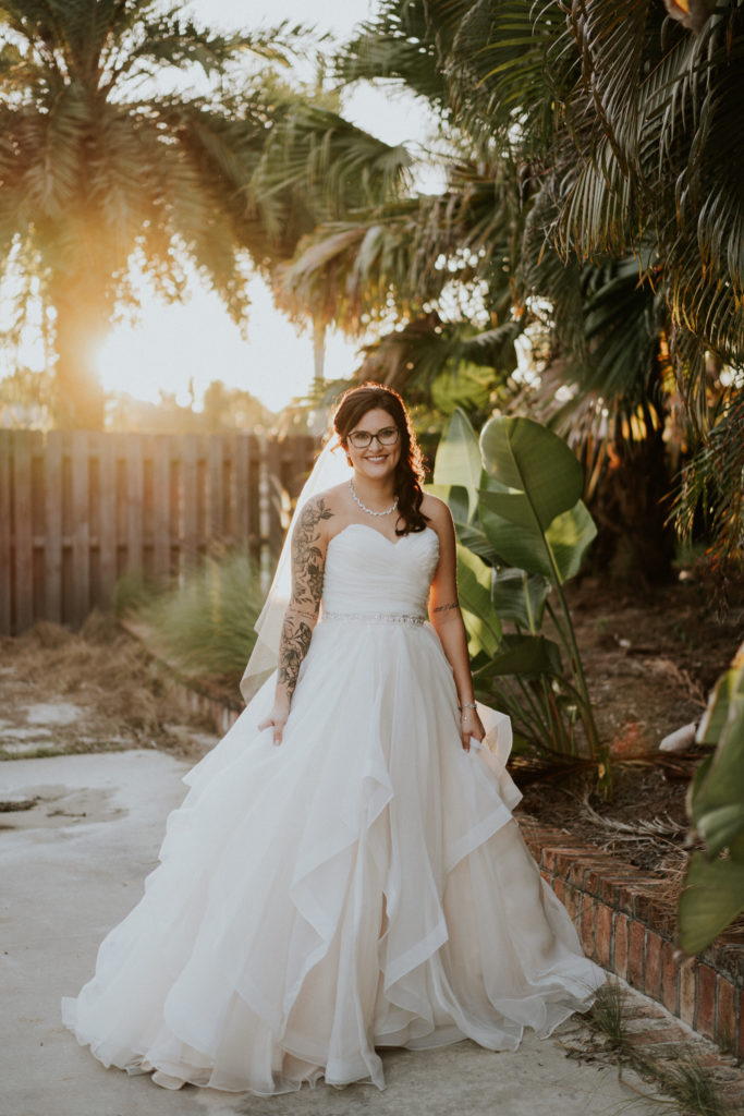 Blush pink organza ballgown wedding dress for Florida bride with jeweled belt Wanderers Club Wellington FL