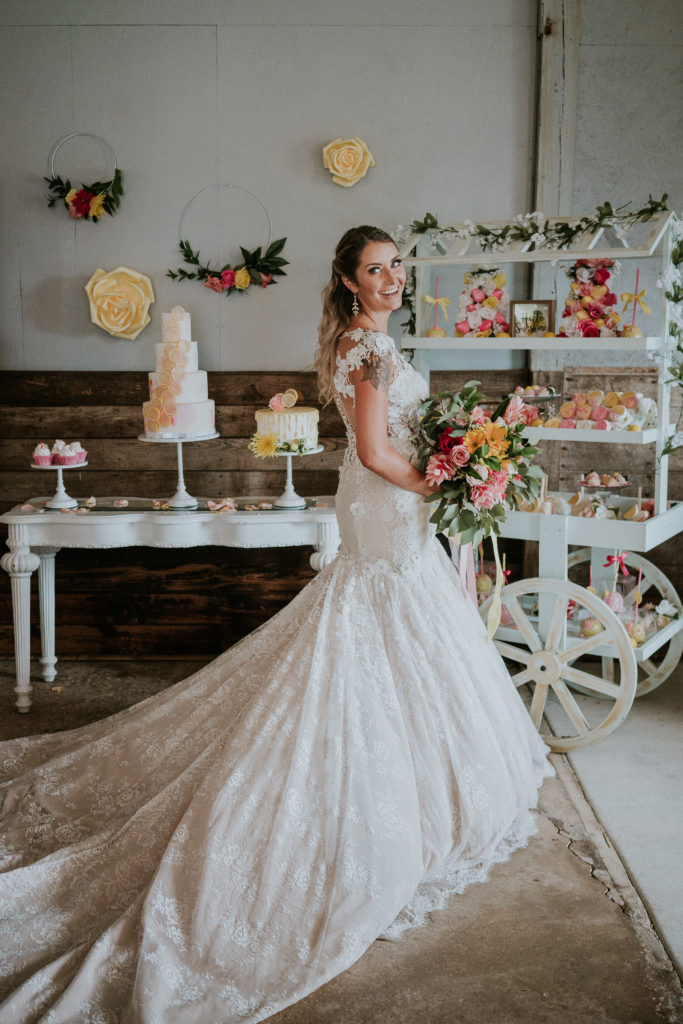 Floral lace appliqué wedding dress for Florida bride with cathedral train Twisted Oak Farm Vero Beach FL