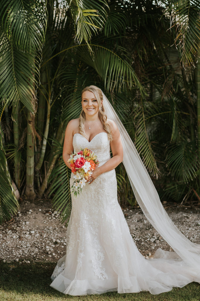 Sweetheart lace organza wedding dress for Florida bride with cathedral veil Sailfish Marina Resort