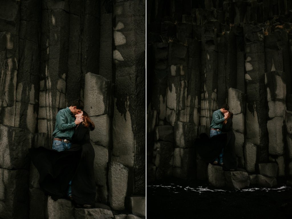Iceland elopement couple kiss on basalt columns at Reynisfjara Black Sand Beach