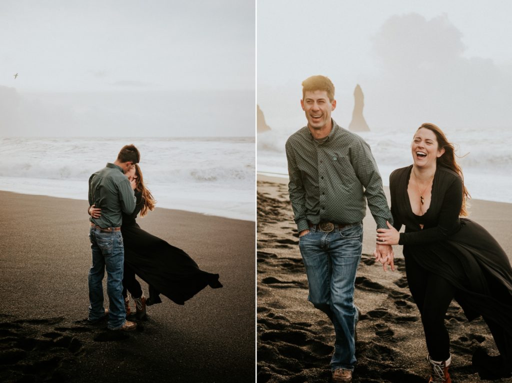 Iceland elopement couple kiss and walk on Black Sand Beach at sunrise in Vík