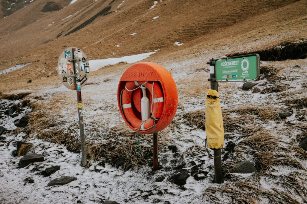 Orange life preserver on Reynisfjara Black Sand Beach Vík