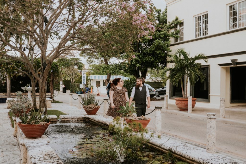 Engagement photos in Worth Ave botanical courtyard Palm beach FL
