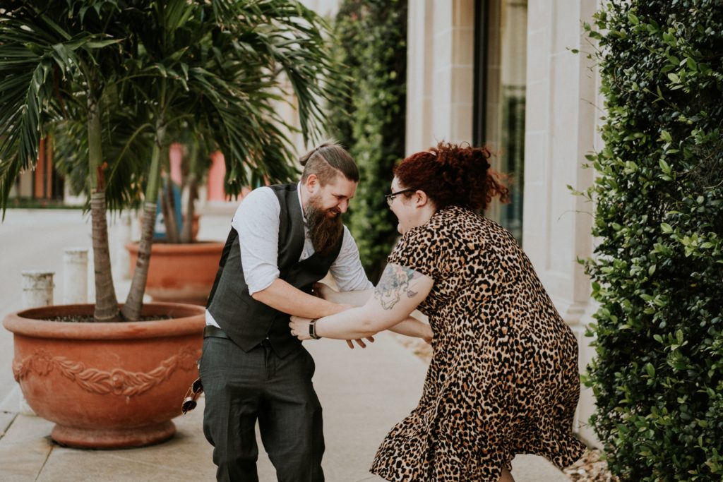 Nikki tickles Matt on Worth Avenue Palm Beach engagement