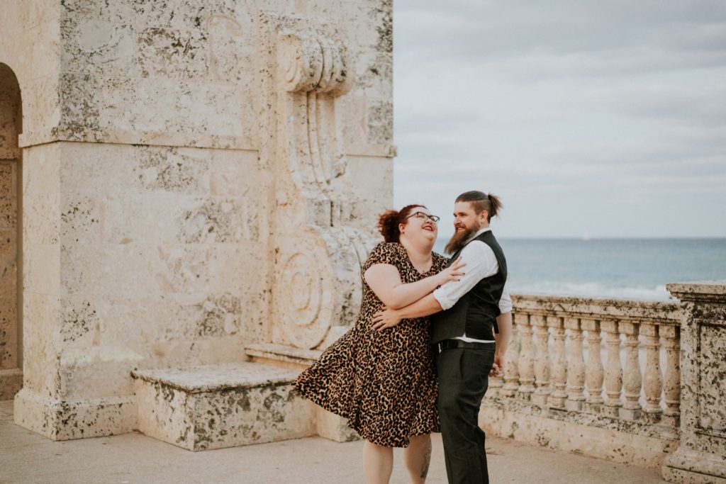Engagement couple dance by Worth Ave Clock Tower Palm Beach FL