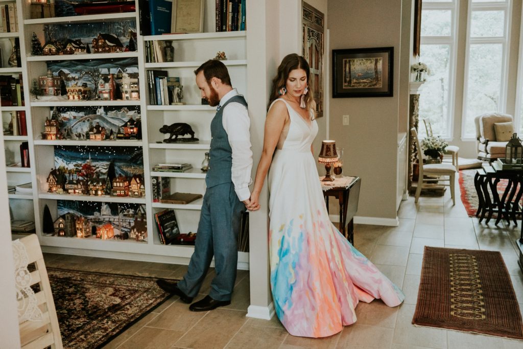 Backyard wedding at-home first touch wearing hand-painted rainbow wedding dress Atlanta GA Florida elopement photography
