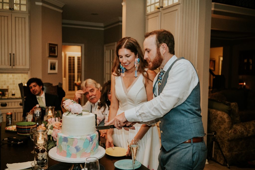 Bride and groom cake cutting at home Atlanta GA wedding FL elopement photography