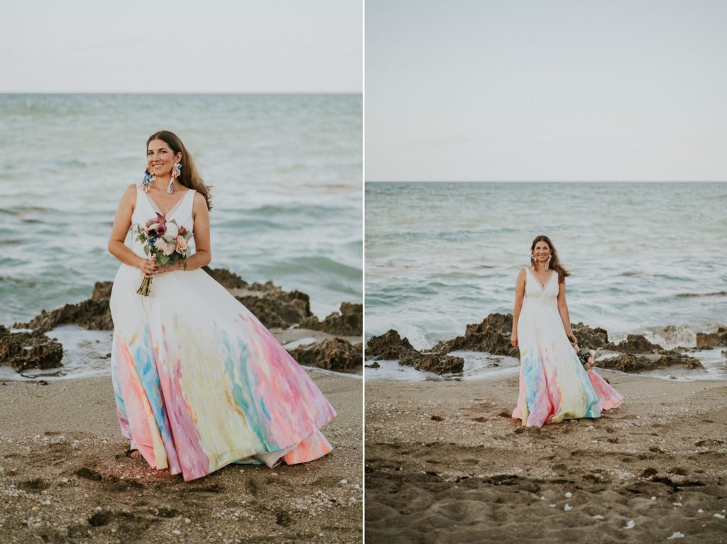 Bride in hand-painted rainbow wedding dress walks on House of Refuge beach Stuart Florida elopement Photography