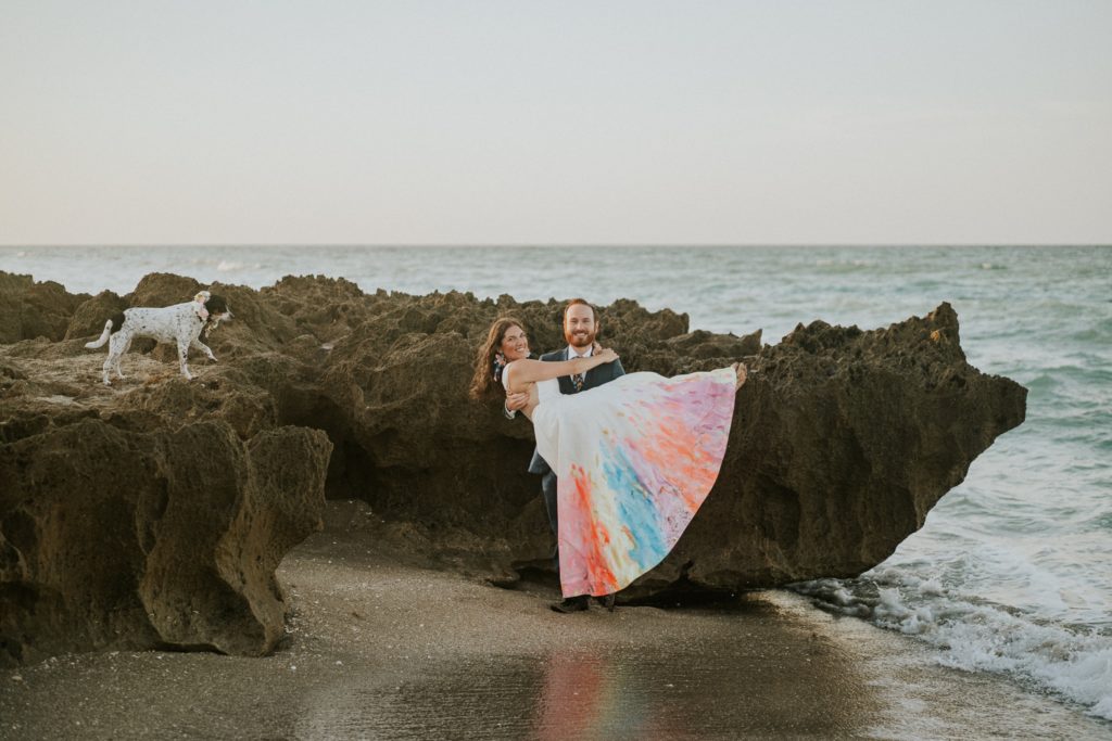 Groom picks up bride beach wedding House of Refuge Stuart FL elopement