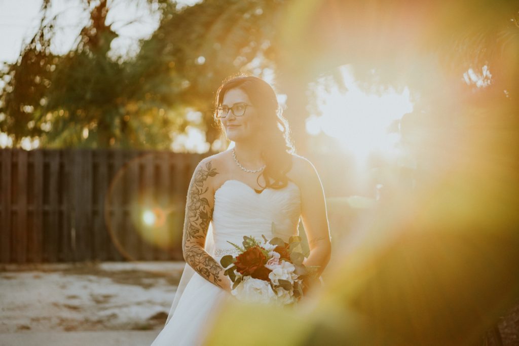 Bride with tattoos portrait sunset golden hour FL wedding photography