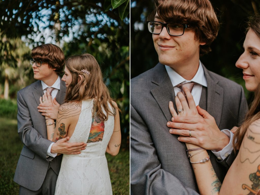 Jupiter Florida backyard wedding elopement couple hold hands and show bride's back tattoo