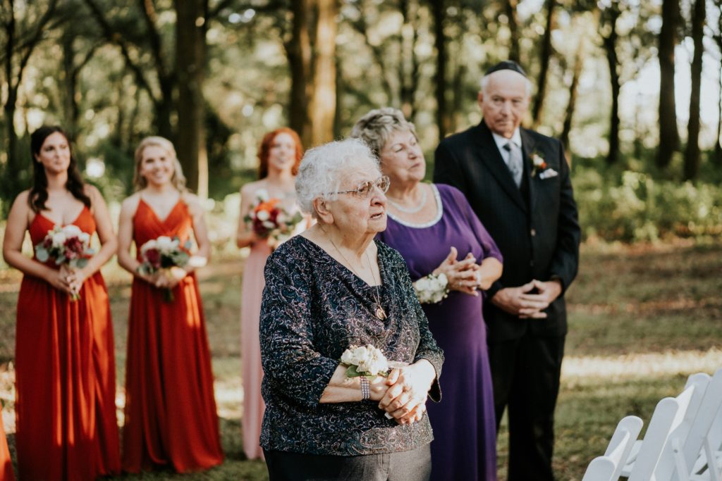 Grandmother sees bride for first time walking down aisle