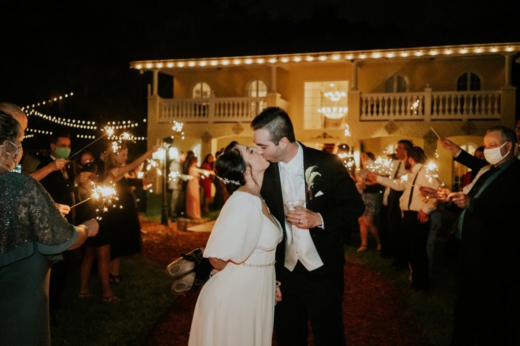 Casa Lantana wedding sparkler exit kiss Stuart FL wedding photographer