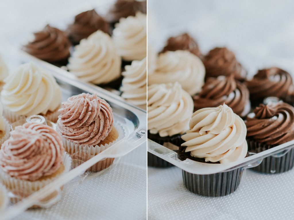 Strawberry, vanilla, and chocolate frosted cupcakes for FL backyard wedding dessert