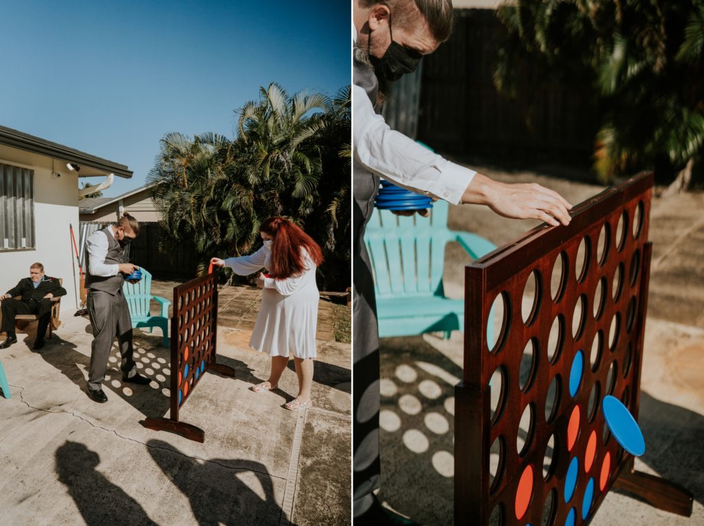 Florida backyard wedding reception with party games Connect Four