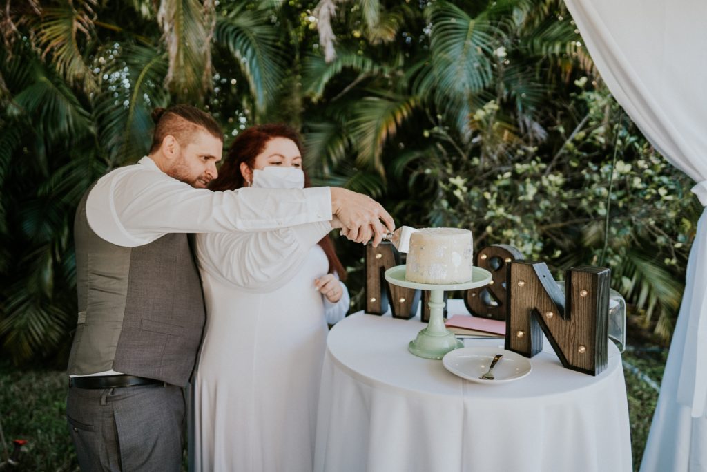 Earth and Sugar cake cutting West Palm Beach backyard wedding