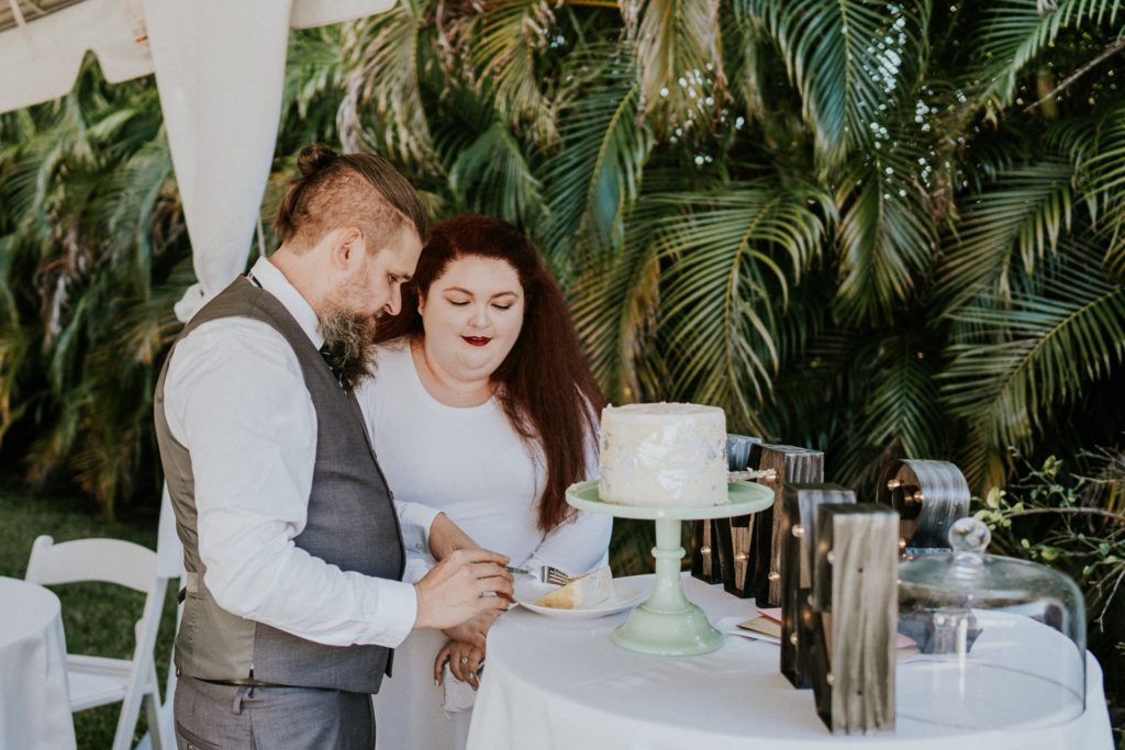 Earth and Sugar cake cutting West Palm Beach FL backyard wedding
