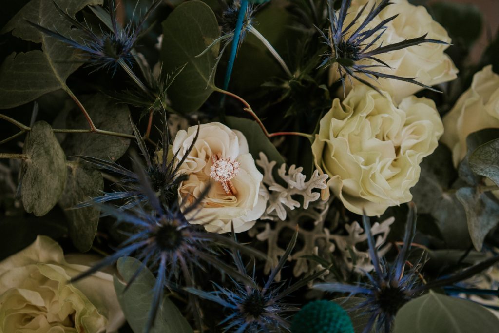Wedding bouquet with blue sea holly flowers by Julie Miner Events