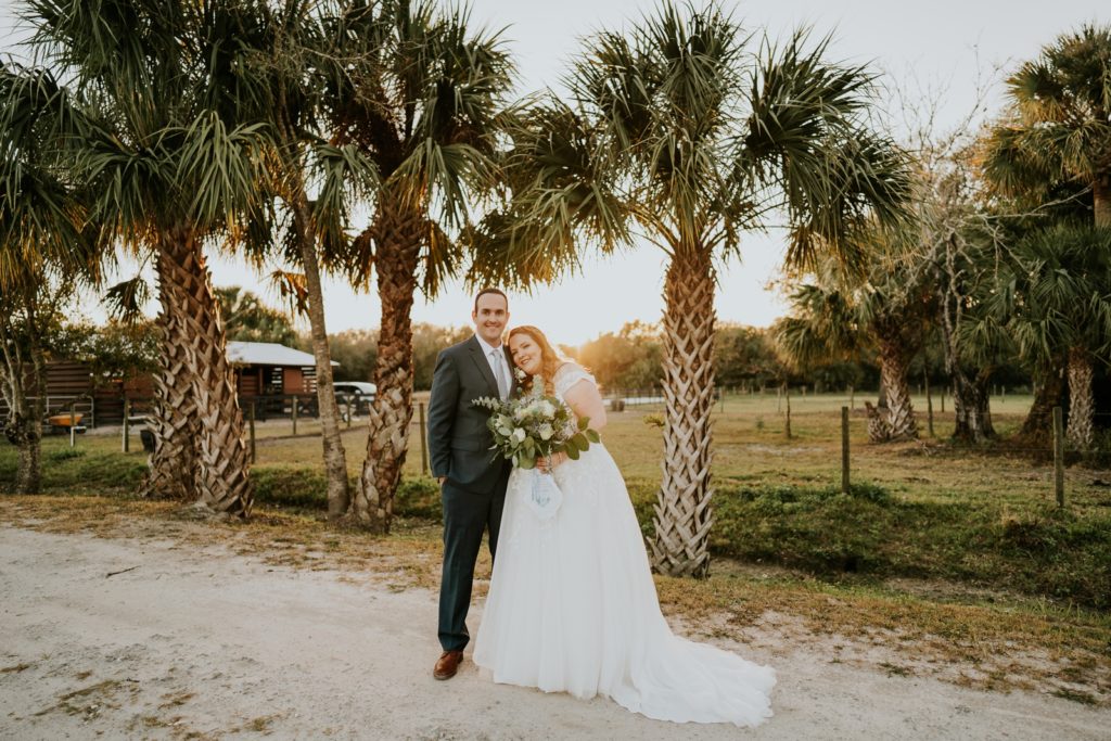 Sunset portraits with palm trees on farm Cattleya Chapel Vero Beach FLwedding photography