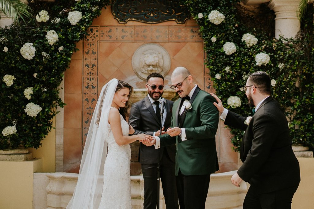 Benvenuto wedding ceremony bride and groom exchange rings