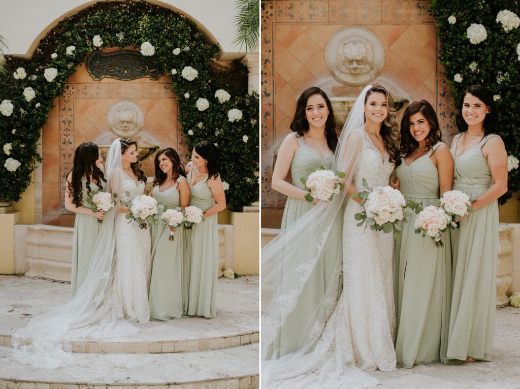 Benvenuto wedding bridesmaids in front of white rose greenery wall