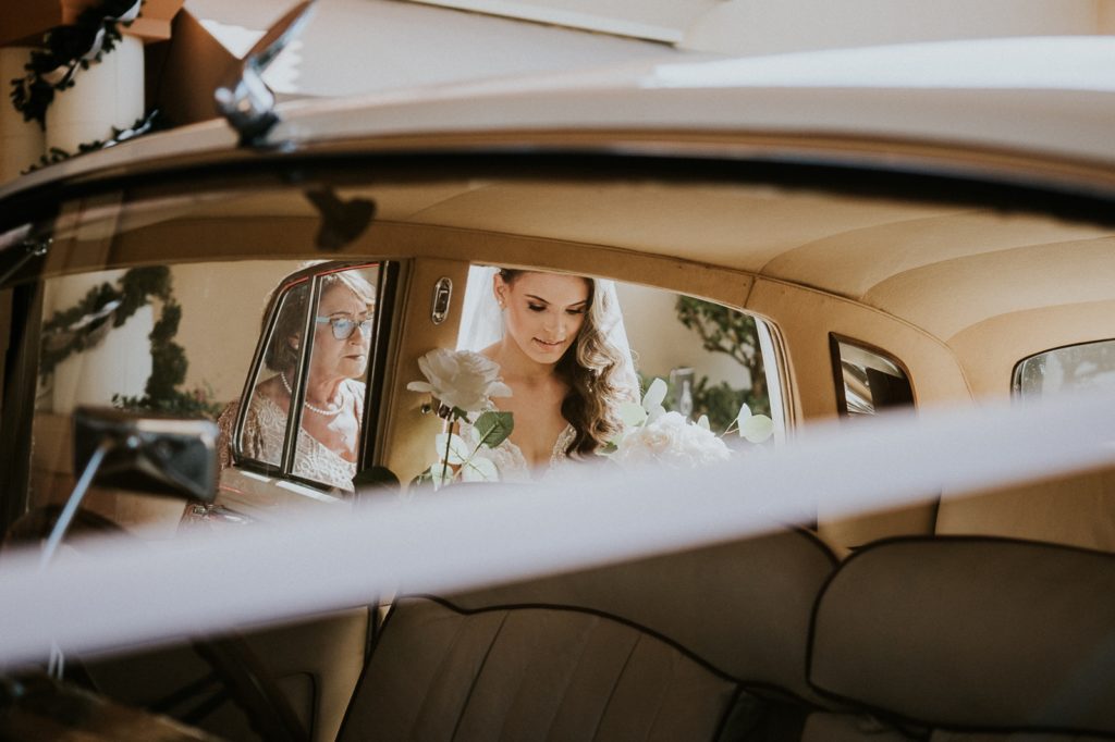Eau Palm Beach wedding bride gets in classic car