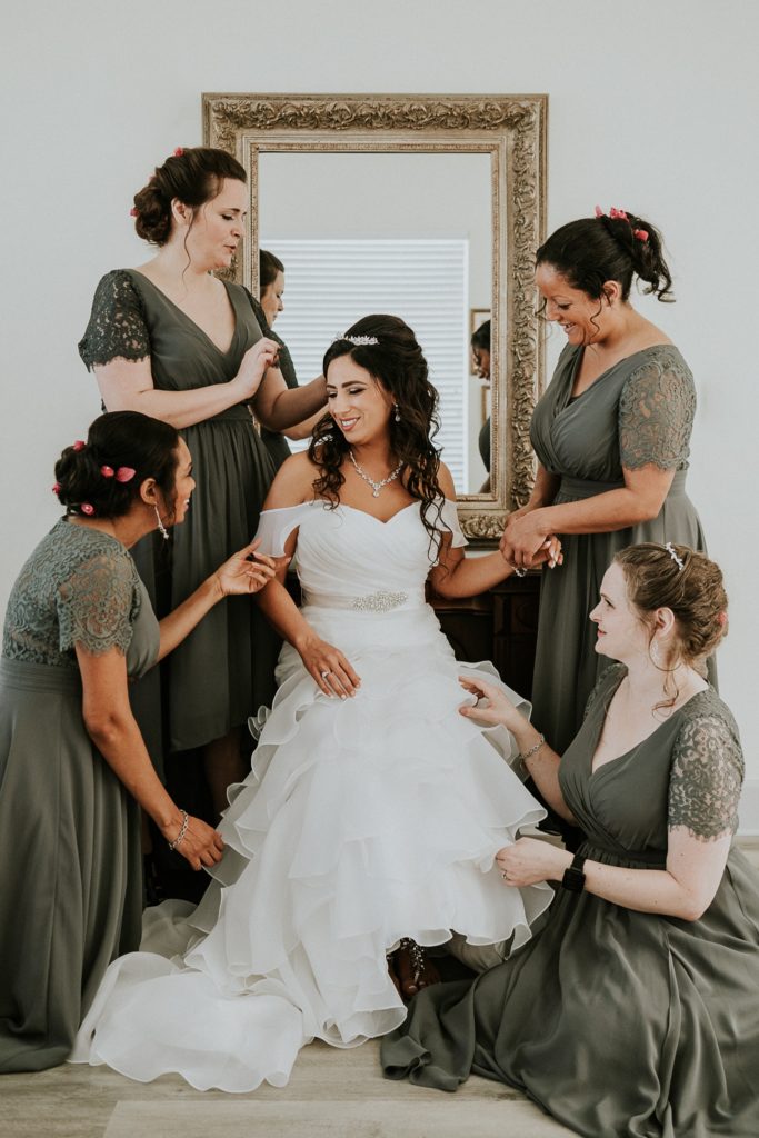 Tuckahoe Mansion wedding bride and bridesmaids getting ready in bridal suite Stuart FL photographer