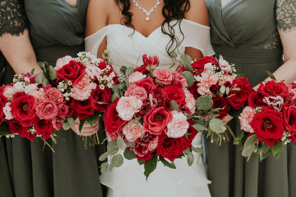 Stuart FL wedding photography bridal party bouquets with pink roses and carnations