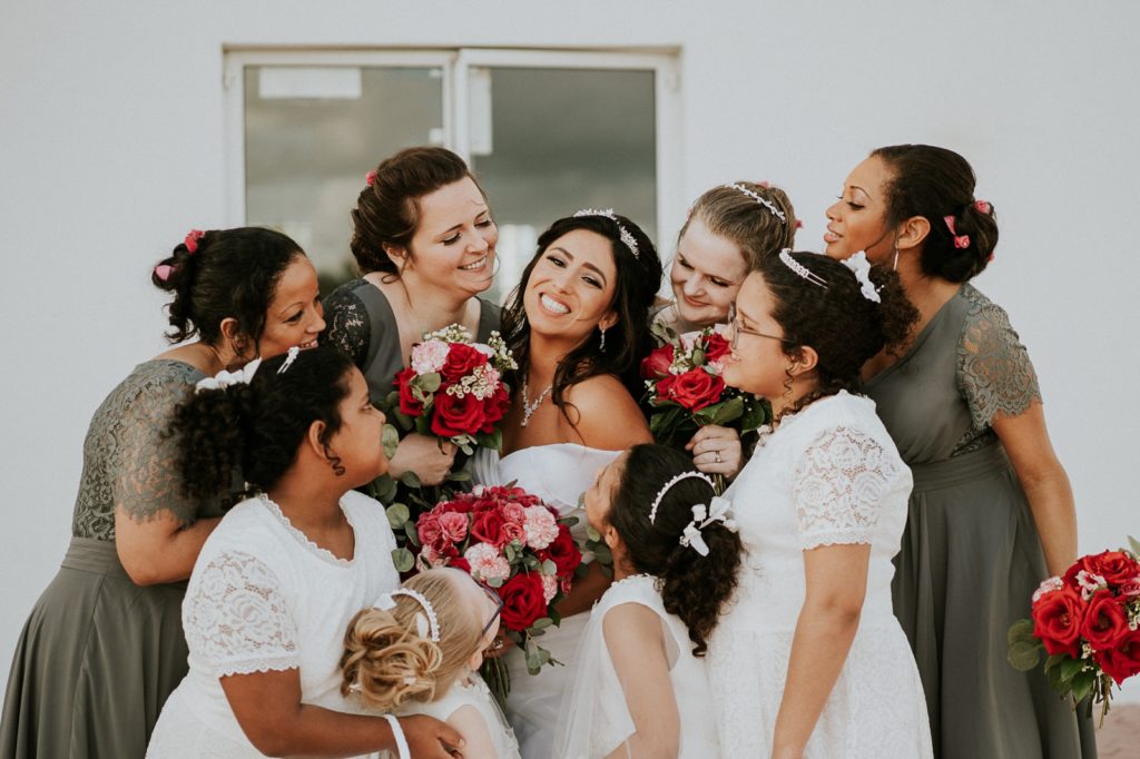Tuckahoe Mansion wedding bridesmaids and flower girls hug bride Jensen Beach FL photography