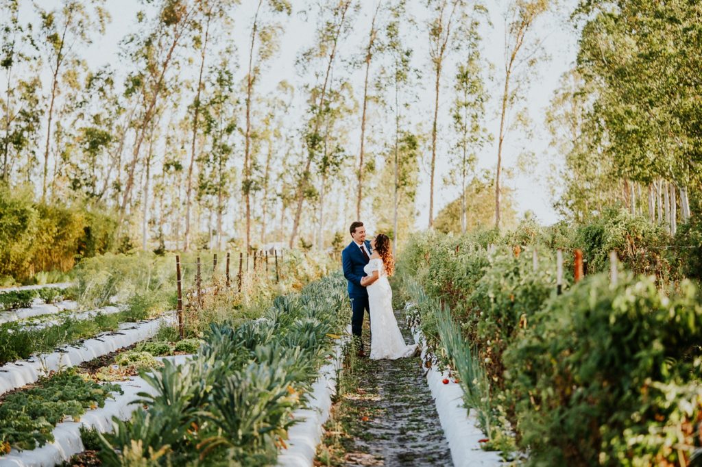 Kai Kai Farm wedding Stuart Florida bride and groom in greenery