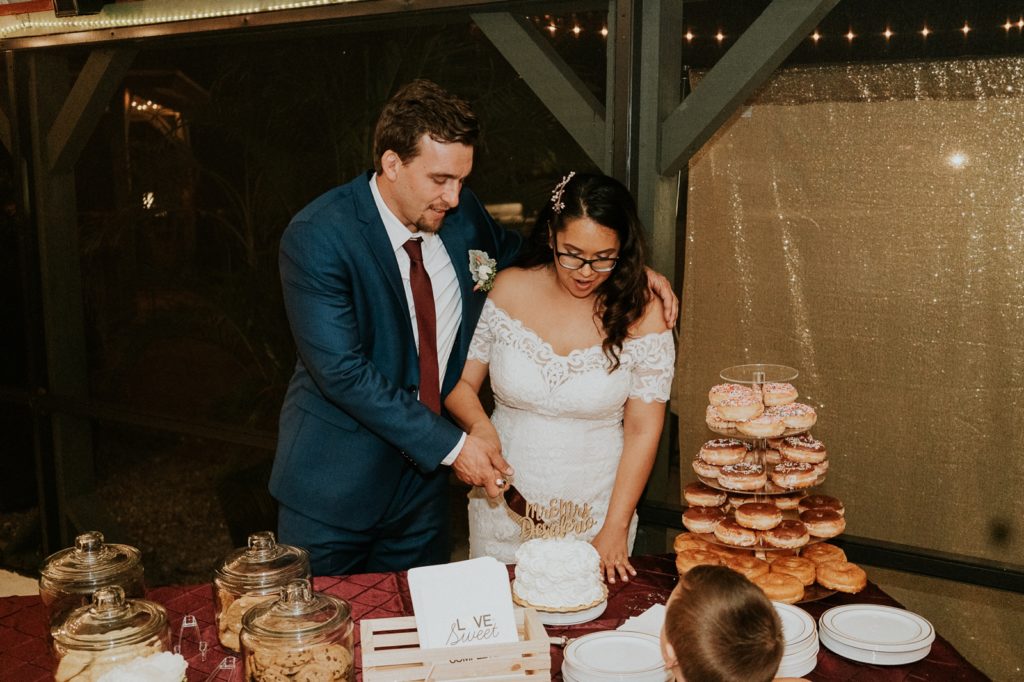 Kai Kai Farm FL wedding reception cake cutting