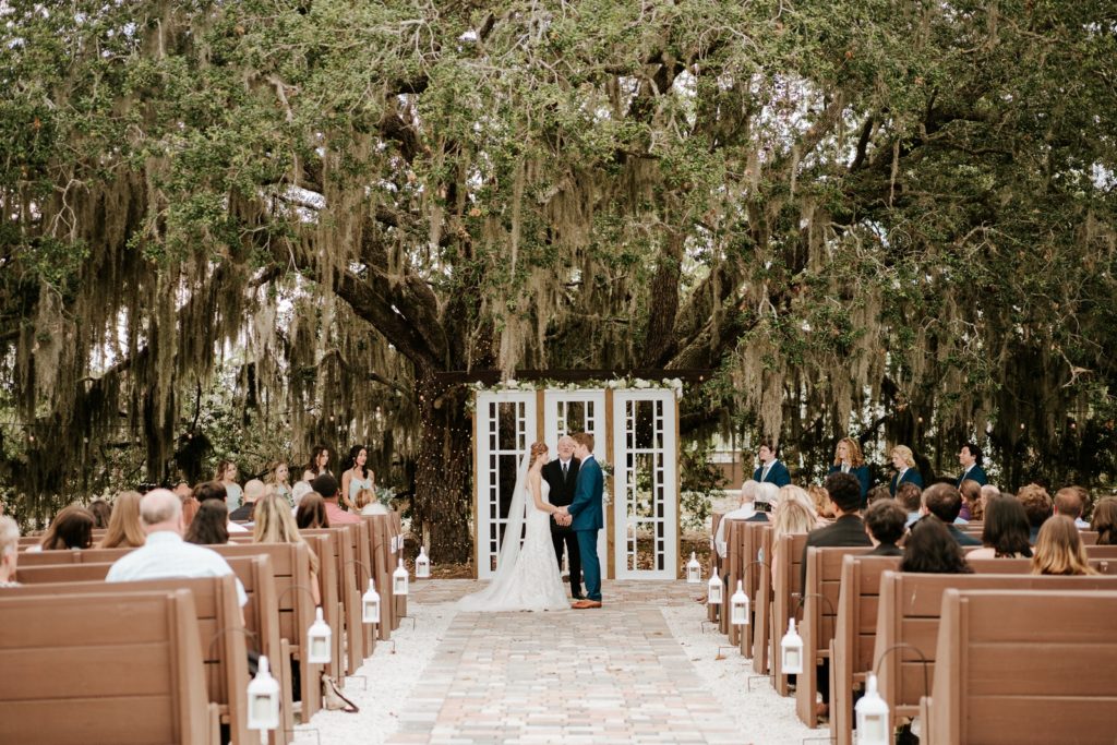 Ever After Farms Ranch wedding ceremony under spanish moss tree