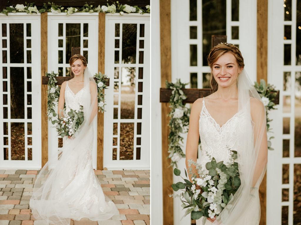 Bridal portrait wearing white lace wedding dress and eucalyptus greenery bouquet